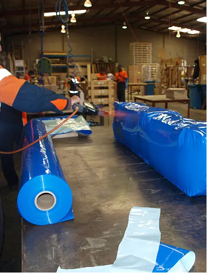 Applying blue shrink wrap